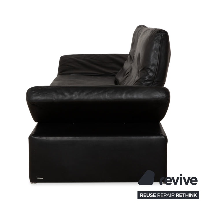 Canapé quatre places Koinor Raoul en cuir gris foncé anthracite et noir, à réglage manuel