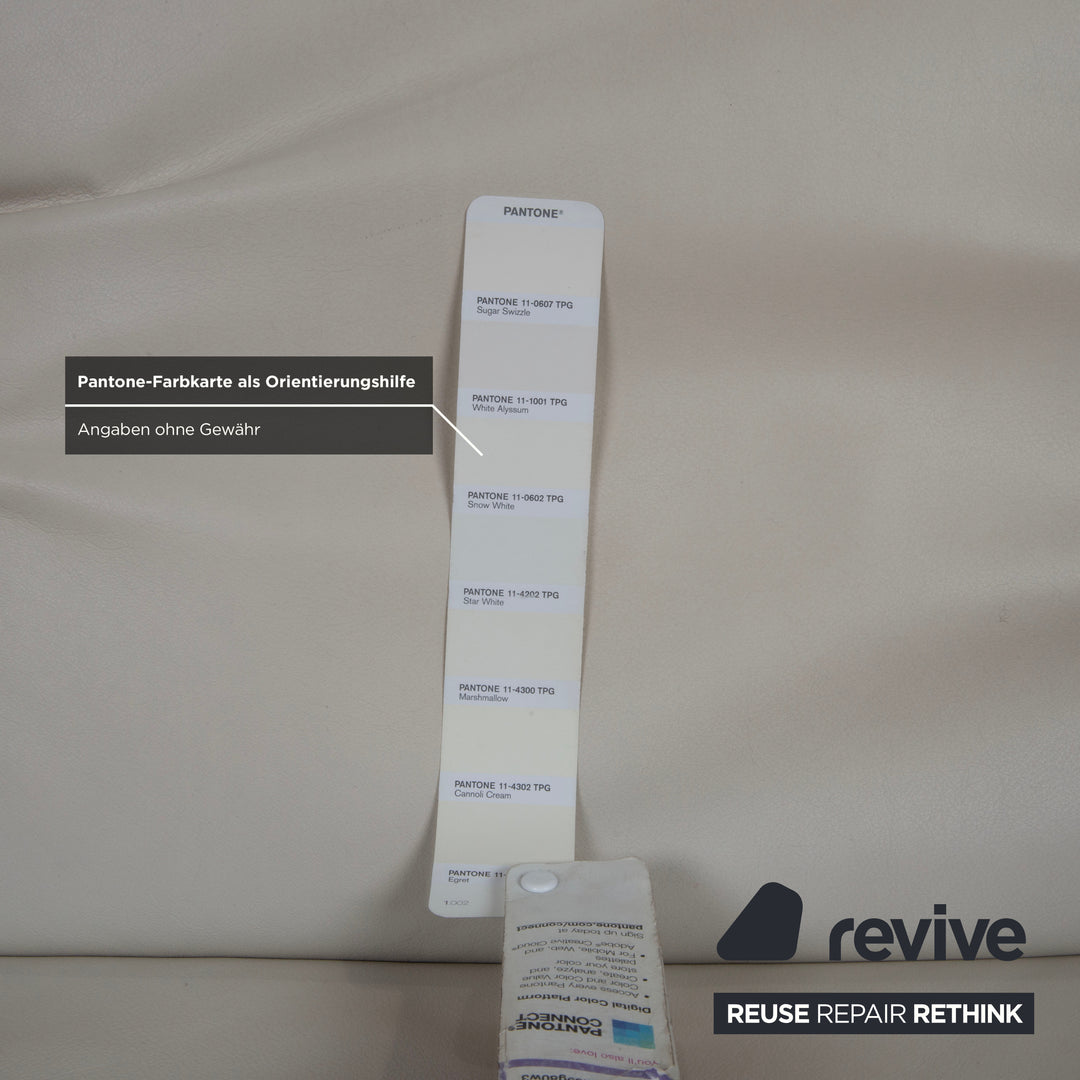 Canapé deux places Koinor Rivoli en cuir crème, blanc, gris et grège, à réglage manuel