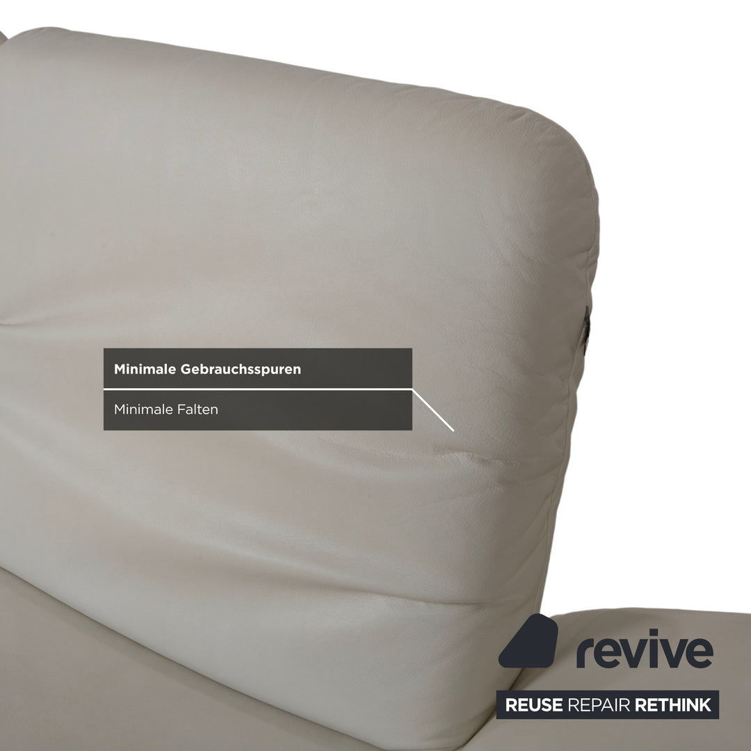 Canapé deux places Koinor Rivoli en cuir crème, blanc, gris et grège, à réglage manuel