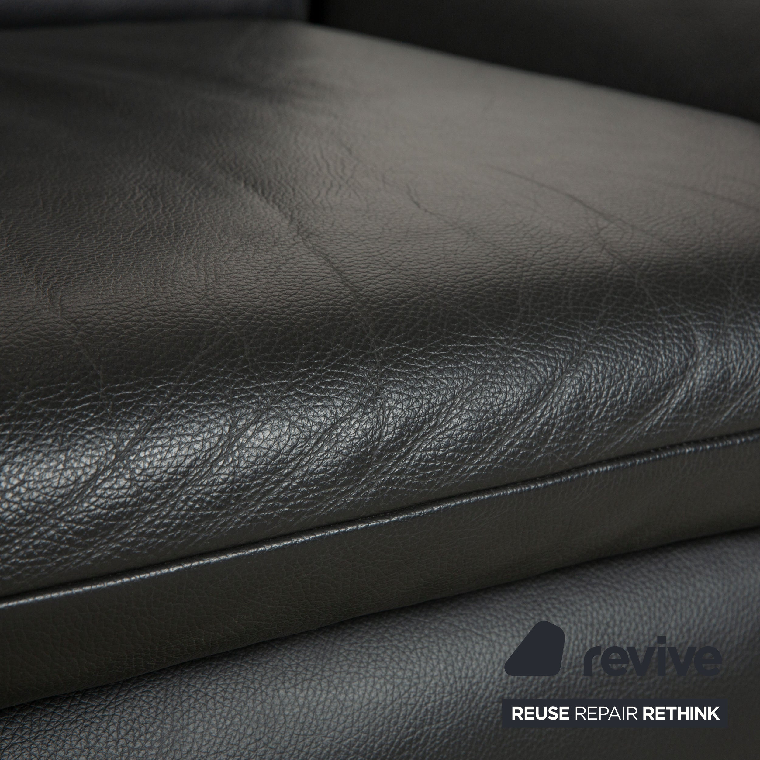 Canapé deux places en cuir gris foncé Koinor Rossini à fonction manuelle