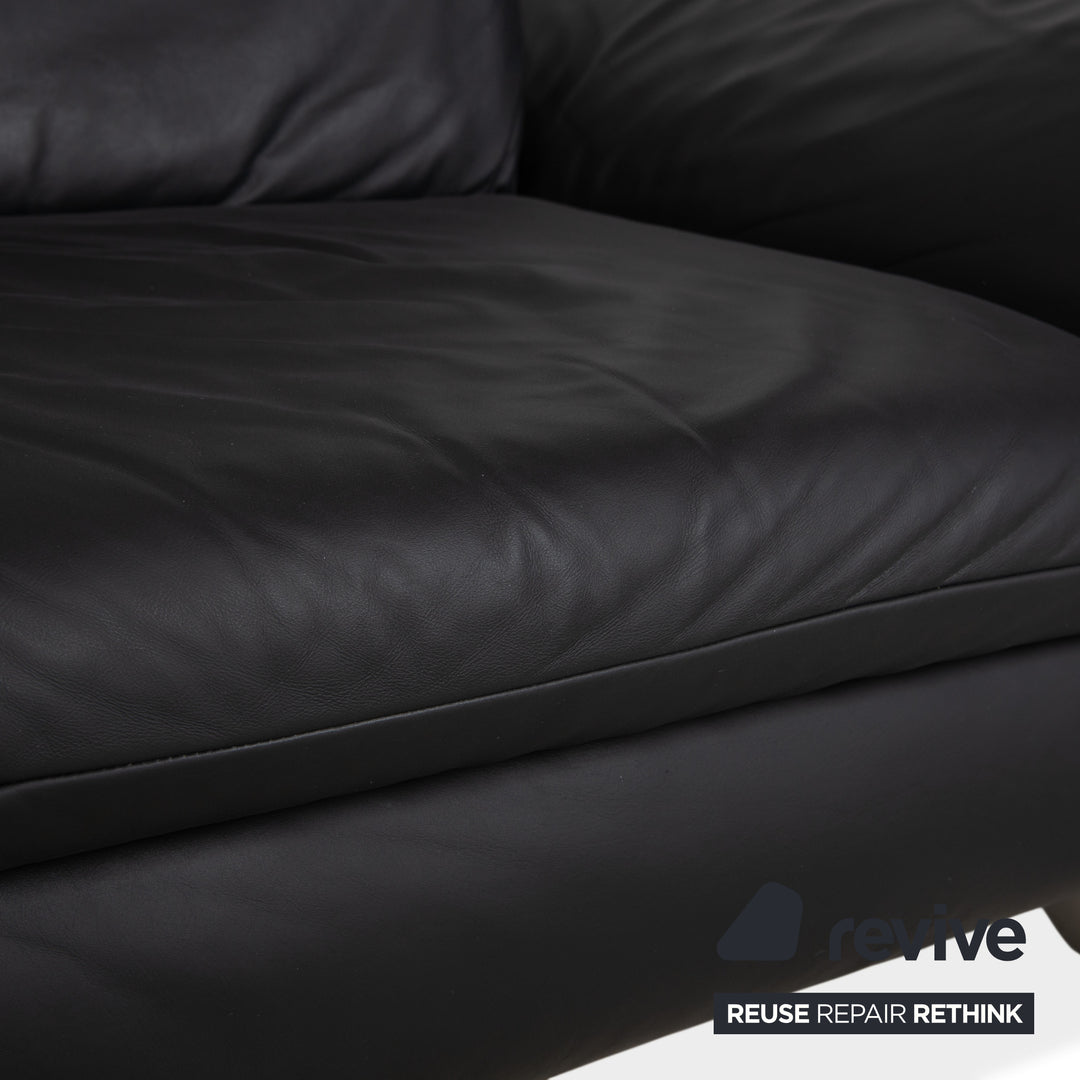 Canapé deux places en cuir Koinor Rossini, gris anthracite, à commande manuelle