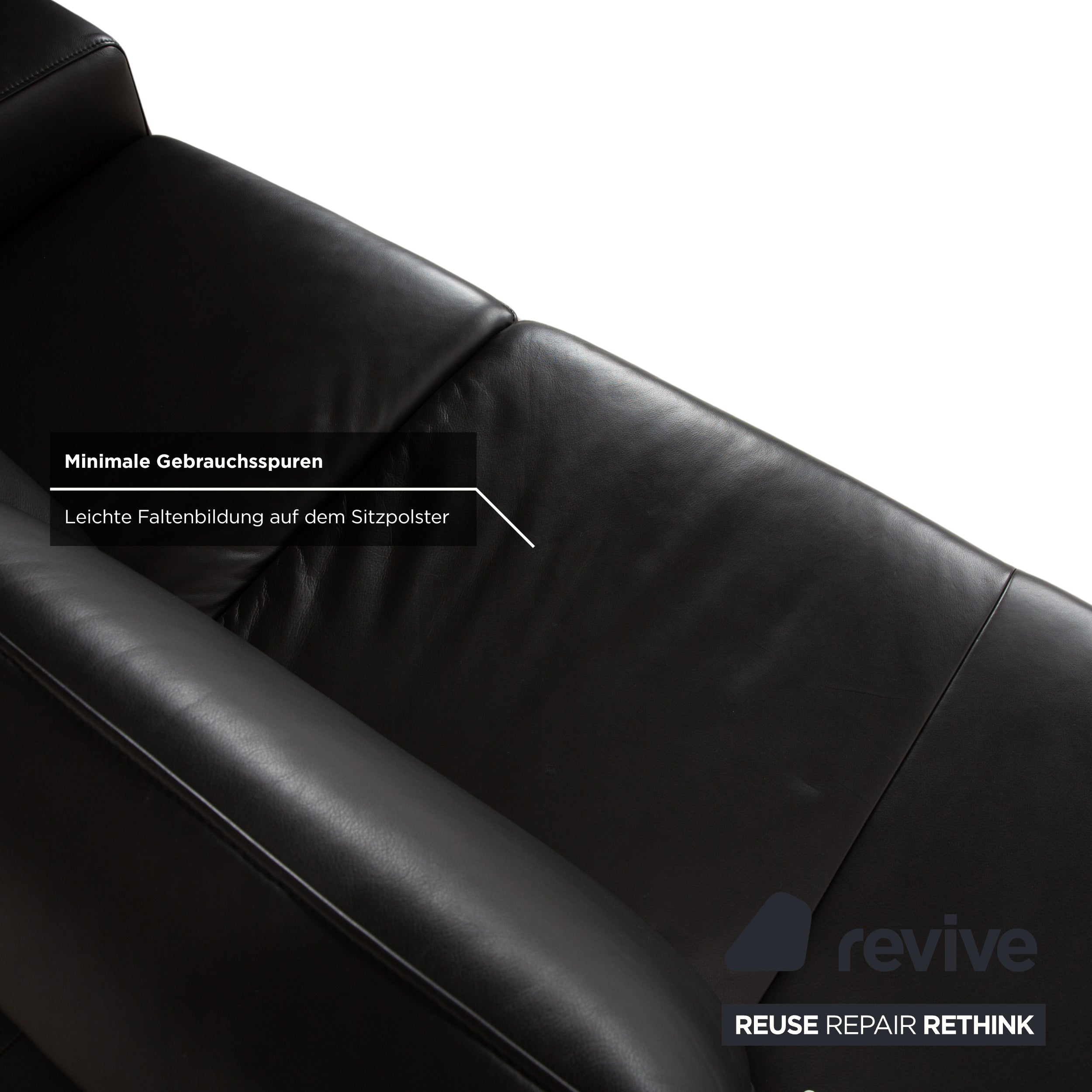 Canapé deux places en cuir noir Koinor Upgrade avec appui-tête