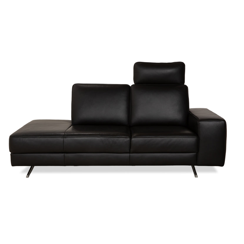 Canapé deux places en cuir noir Koinor Upgrade avec appui-tête