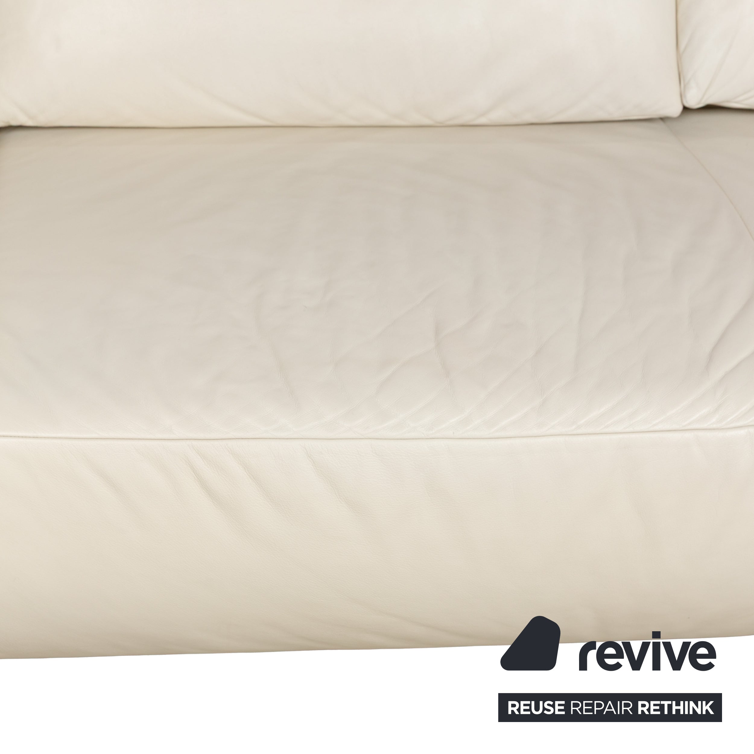 Canapé trois places en cuir blanc crème Koinor Volare à fonction manuelle