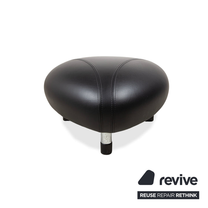 Fauteuil et tabouret en cuir noir Leolux Papageno