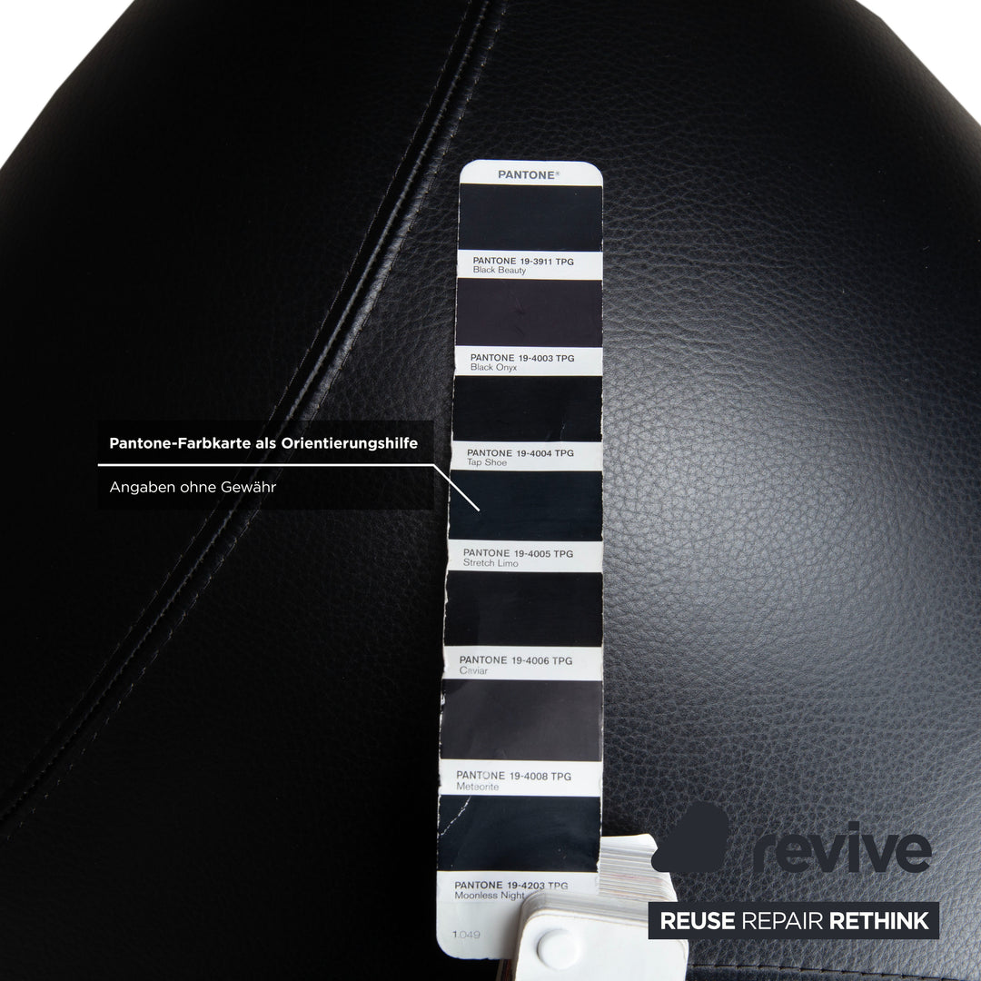 Fauteuil et tabouret en cuir noir Leolux Papageno