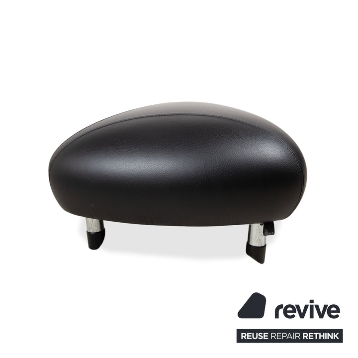 Fauteuil et tabouret en cuir noir Leolux Papageno