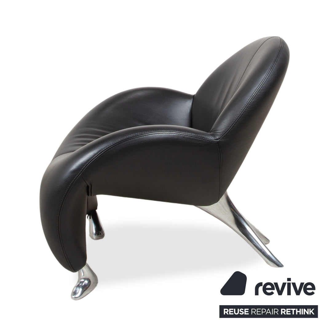 Fauteuil et tabouret en cuir noir Leolux Papageno