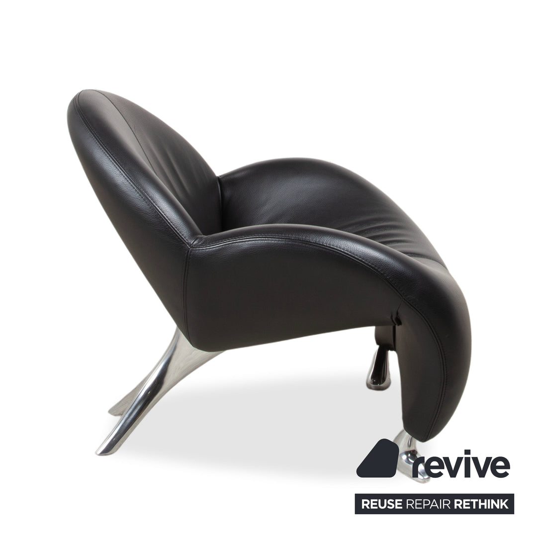 Fauteuil et tabouret en cuir noir Leolux Papageno