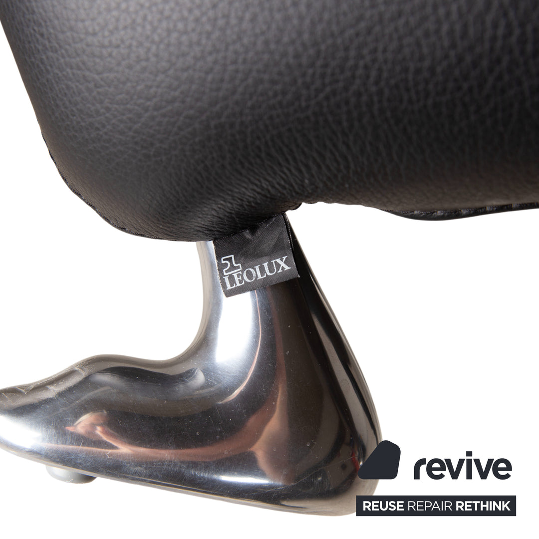 Fauteuil et tabouret en cuir noir Leolux Papageno