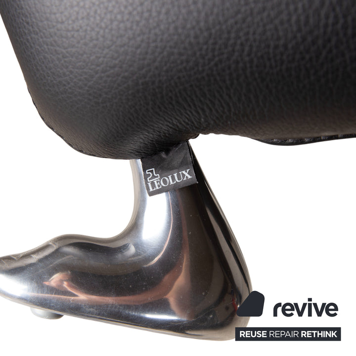 Fauteuil et tabouret en cuir noir Leolux Papageno