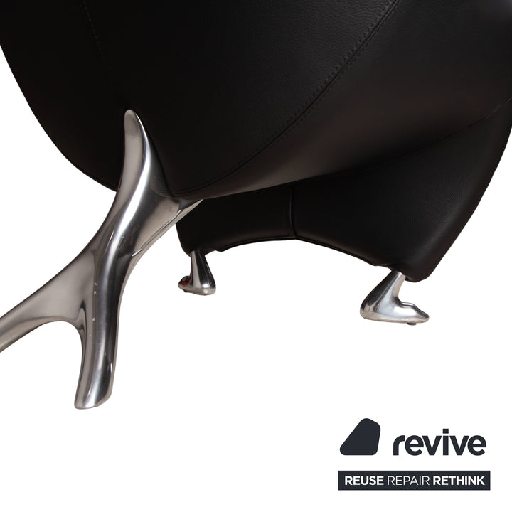 Fauteuil et tabouret en cuir noir Leolux Papageno