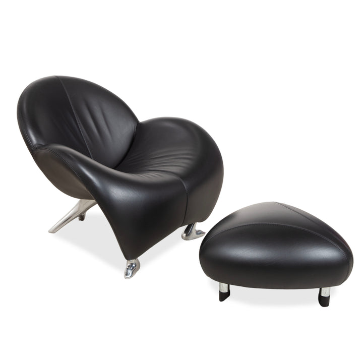 Fauteuil et tabouret en cuir noir Leolux Papageno