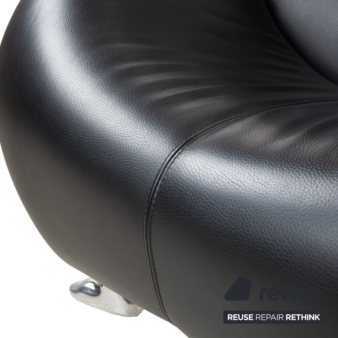 Fauteuil et tabouret en cuir noir Leolux Papageno