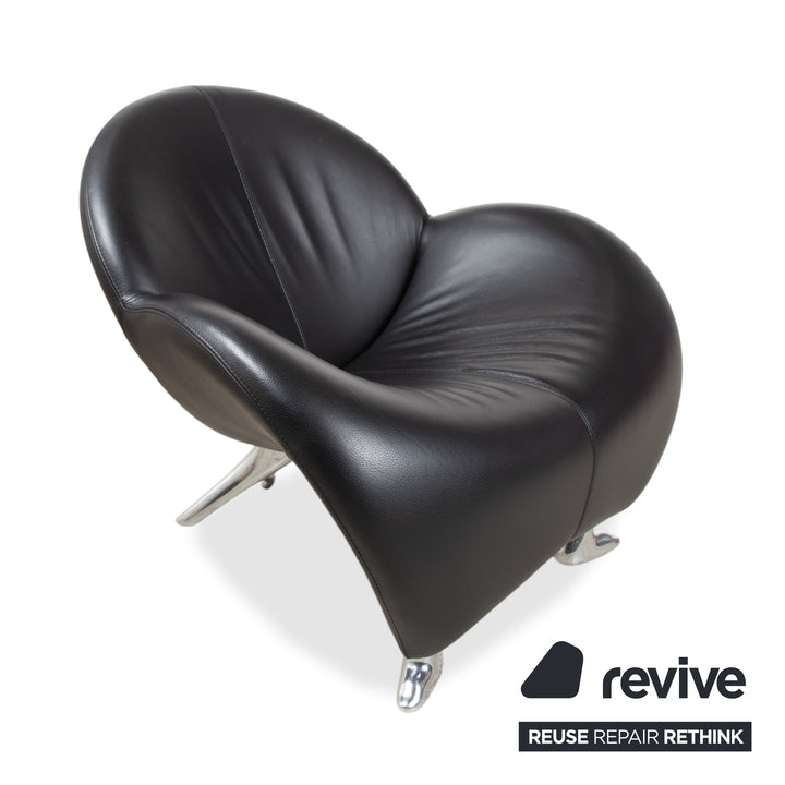 Fauteuil et tabouret en cuir noir Leolux Papageno