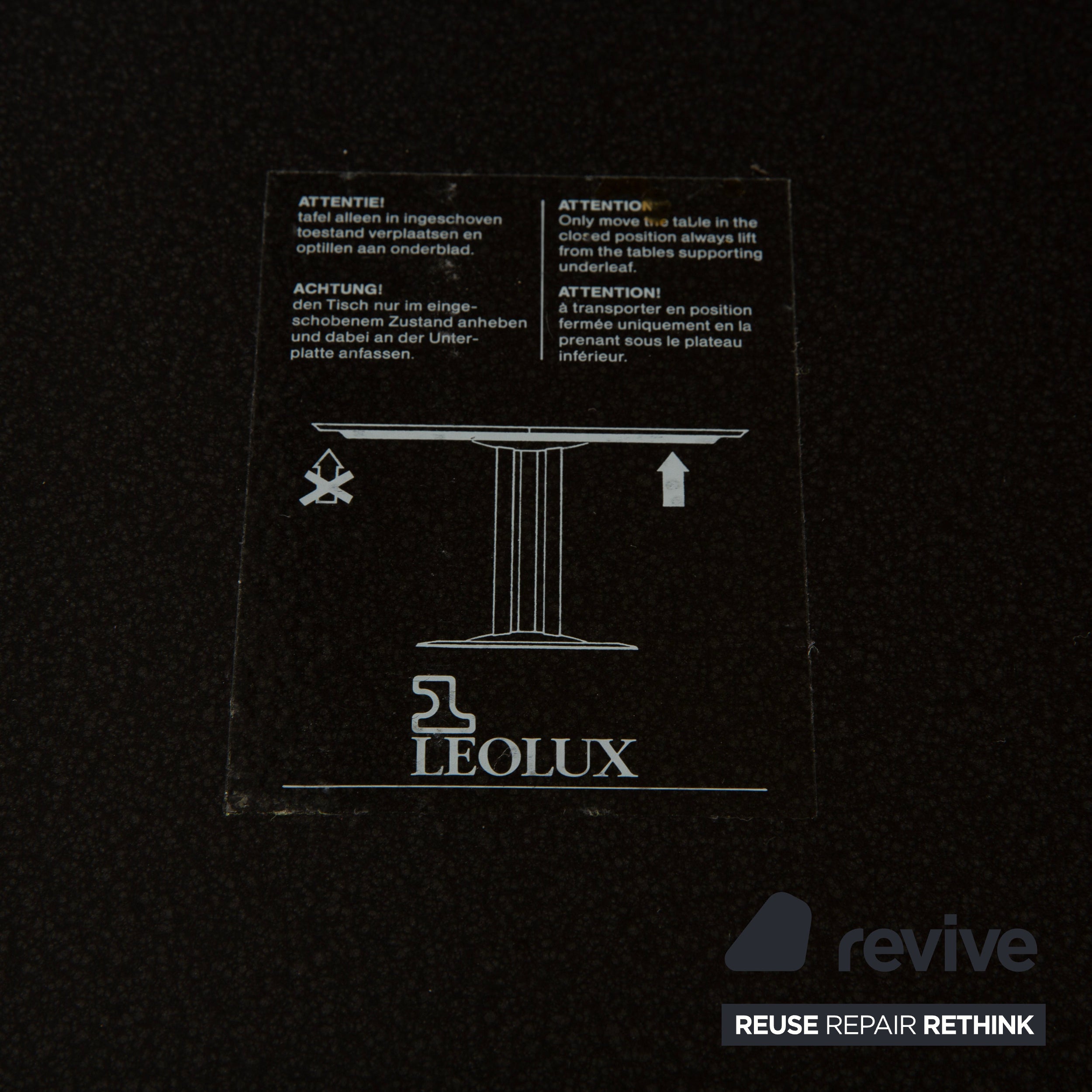 Leolux Trias wooden dining table black anthracite manual function extension function
