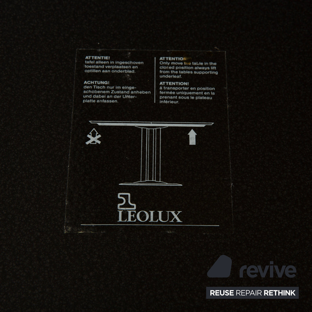 Leolux Trias wooden dining table black anthracite manual function extension function