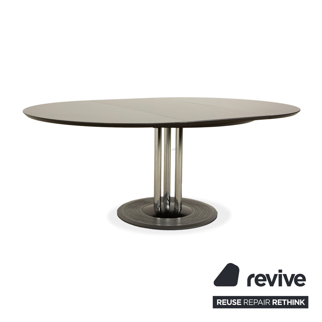 Leolux Trias wooden dining table black anthracite manual function extension function