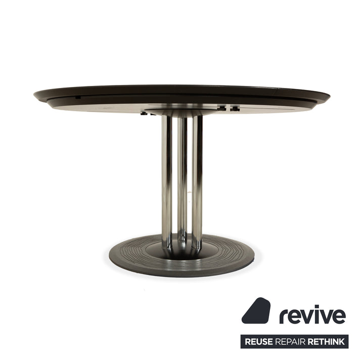 Leolux Trias wooden dining table black anthracite manual function extension function