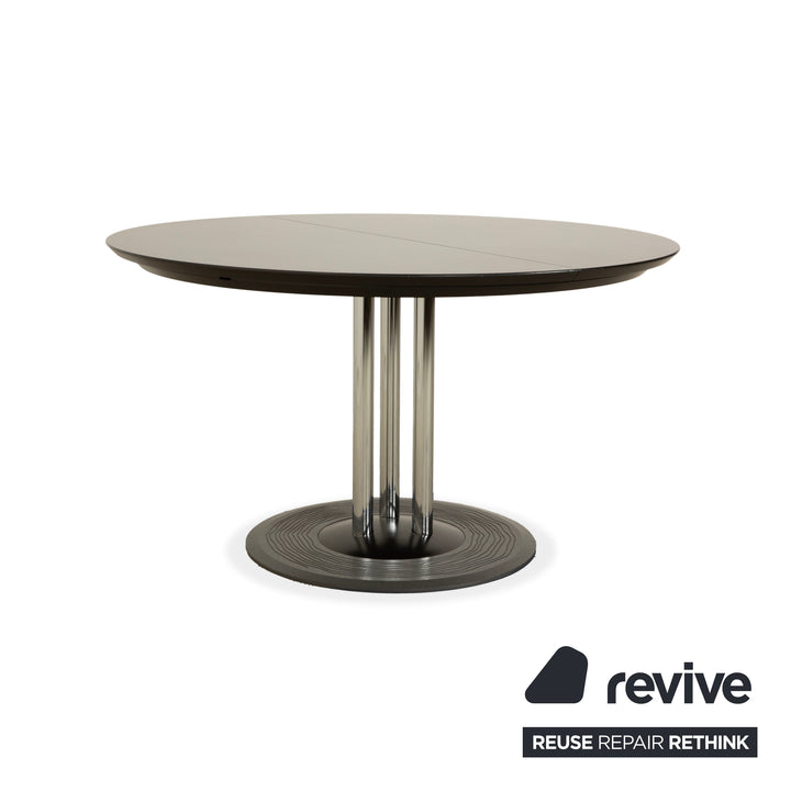 Leolux Trias wooden dining table black anthracite manual function extension function