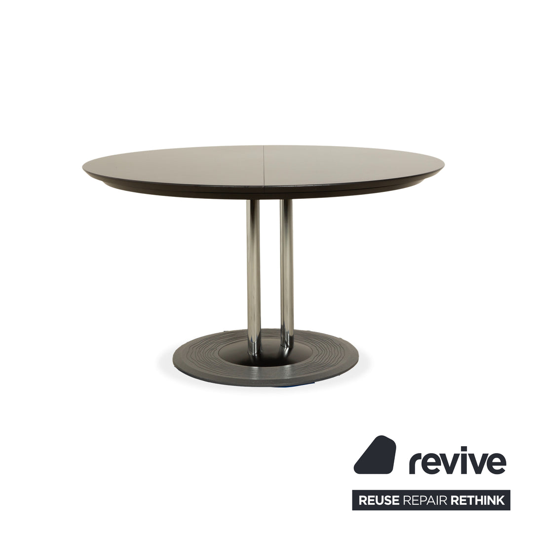 Leolux Trias wooden dining table black anthracite manual function extension function