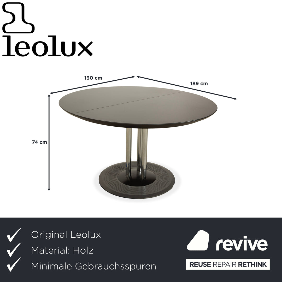 Leolux Trias wooden dining table black anthracite manual function extension function