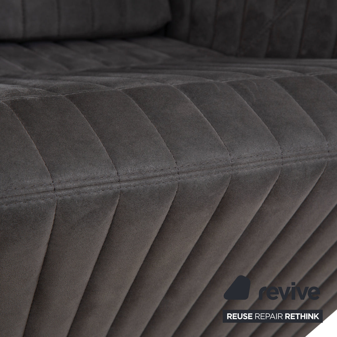 Fauteuil tabouret gris en tissu à facettes rosette ligne