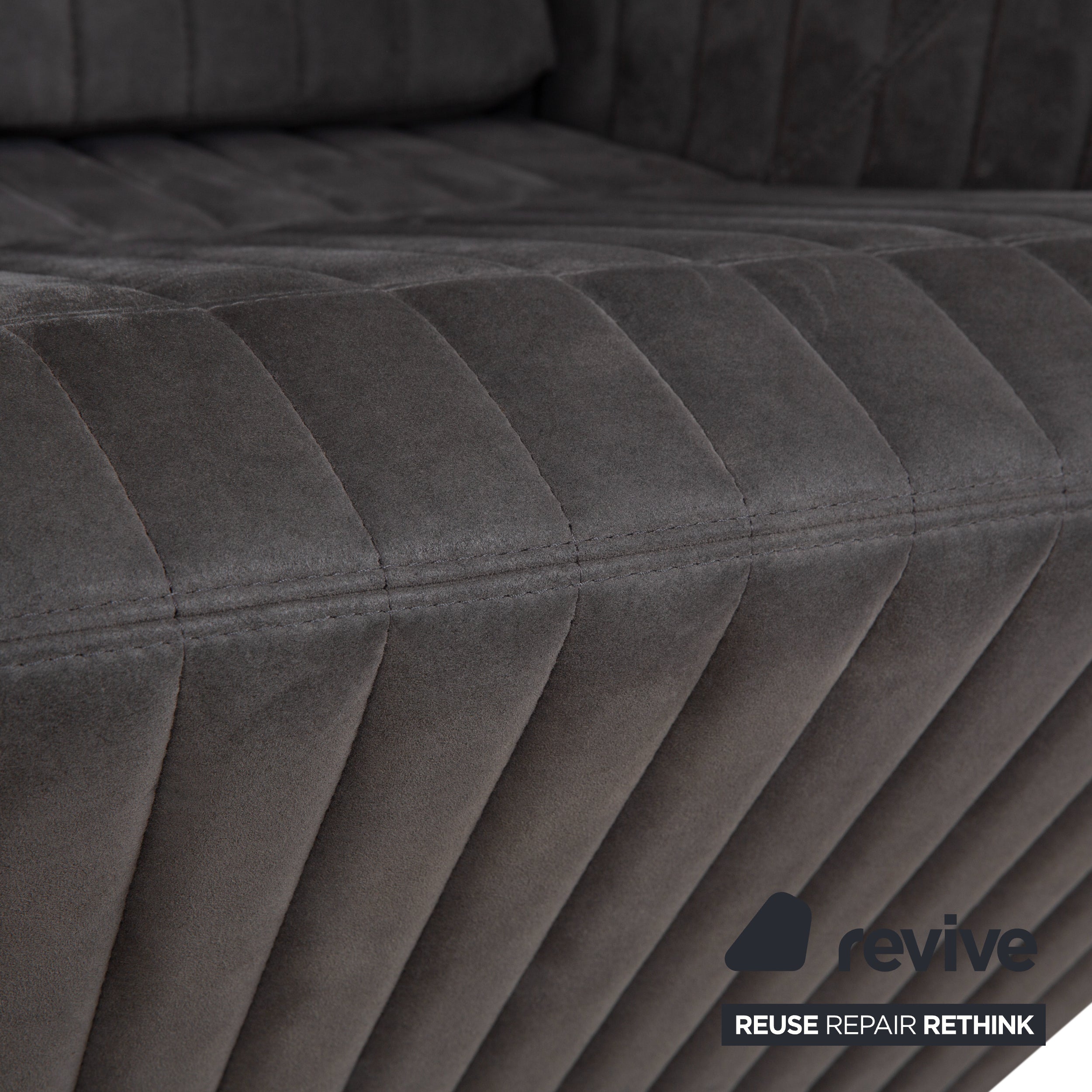 Fauteuil tabouret gris en tissu à facettes rosette ligne