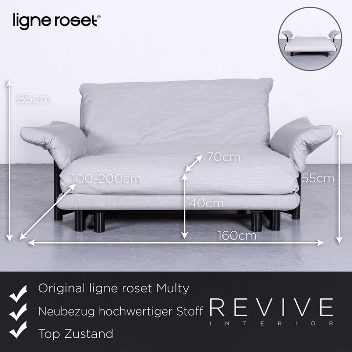 Canapé trois places Multy Designer de Ligne Roset en tissu gris, fonction convertible avec accoudoirs