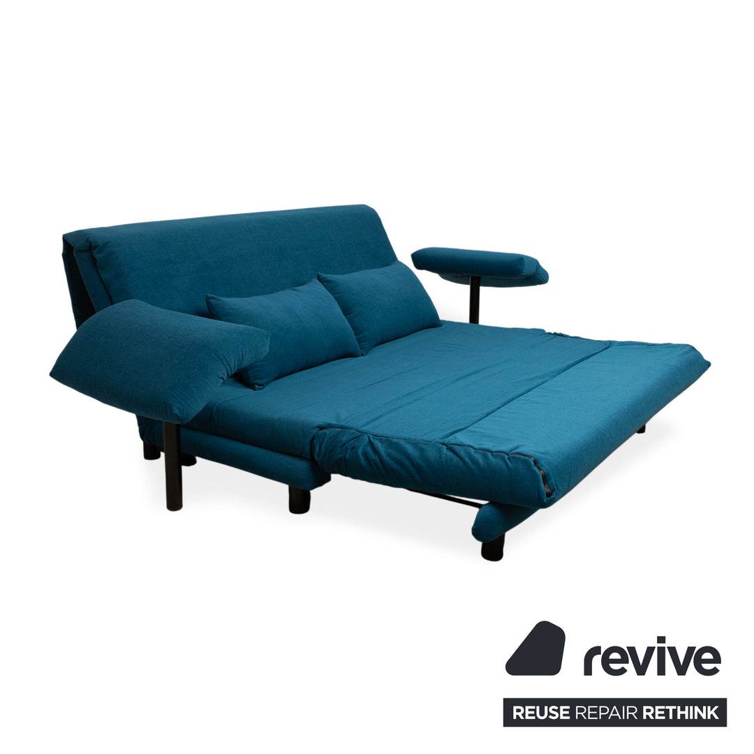 Canapé trois places Ligne Roset Multy, tissu bleu, accoudoirs compris, structure noire, fonction lit manuel, retapissé