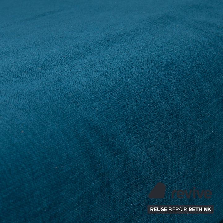 Canapé trois places Ligne Roset Multy, tissu bleu, accoudoirs compris, structure noire, fonction lit manuel, retapissé