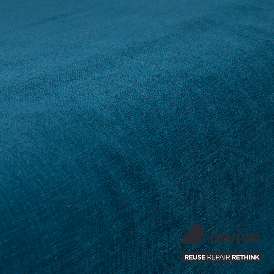 Canapé trois places Ligne Roset Multy, tissu bleu, accoudoirs compris, structure noire, fonction lit manuel, retapissé