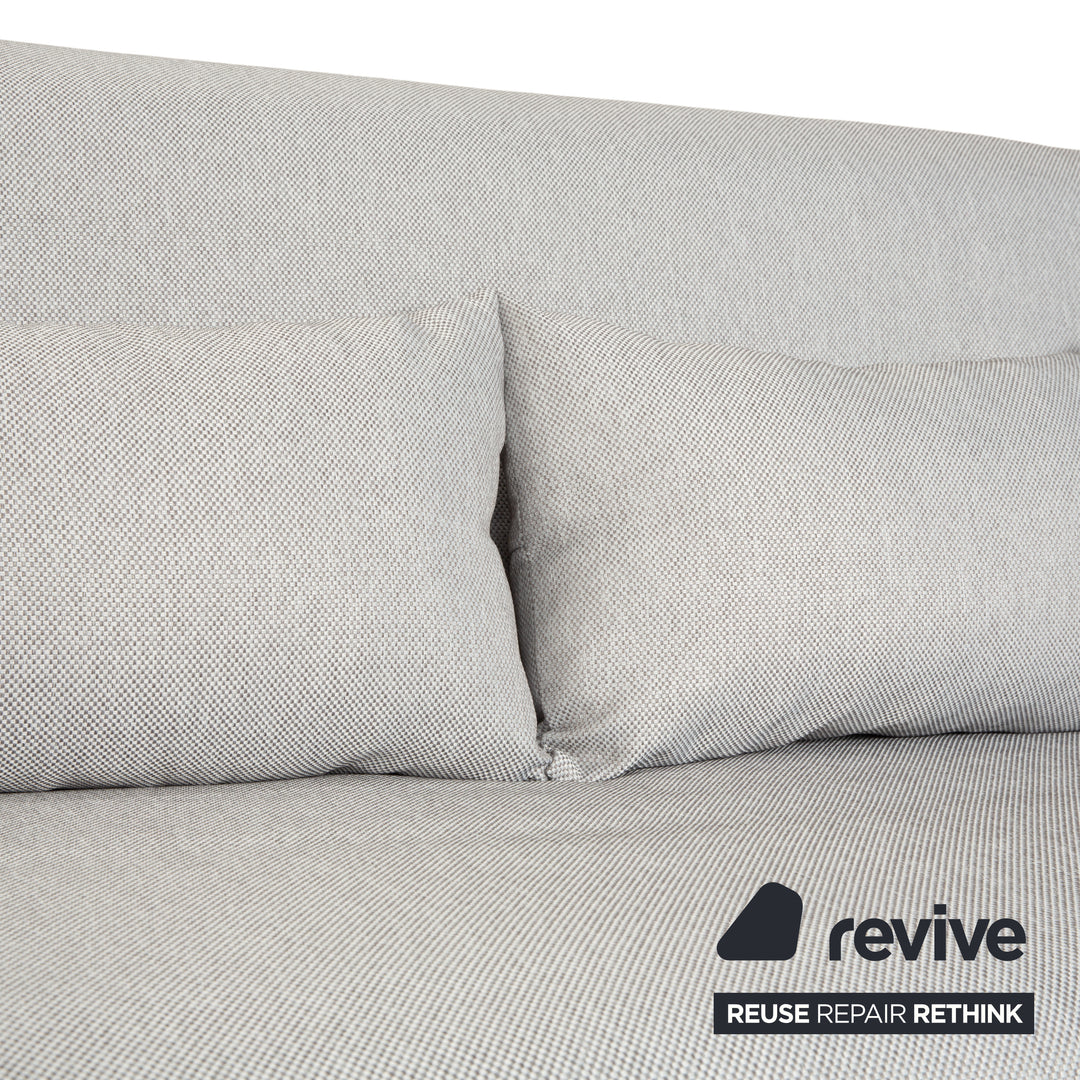 Réfection du canapé-lit manuel trois places Ligne Roset Multy en tissu gris