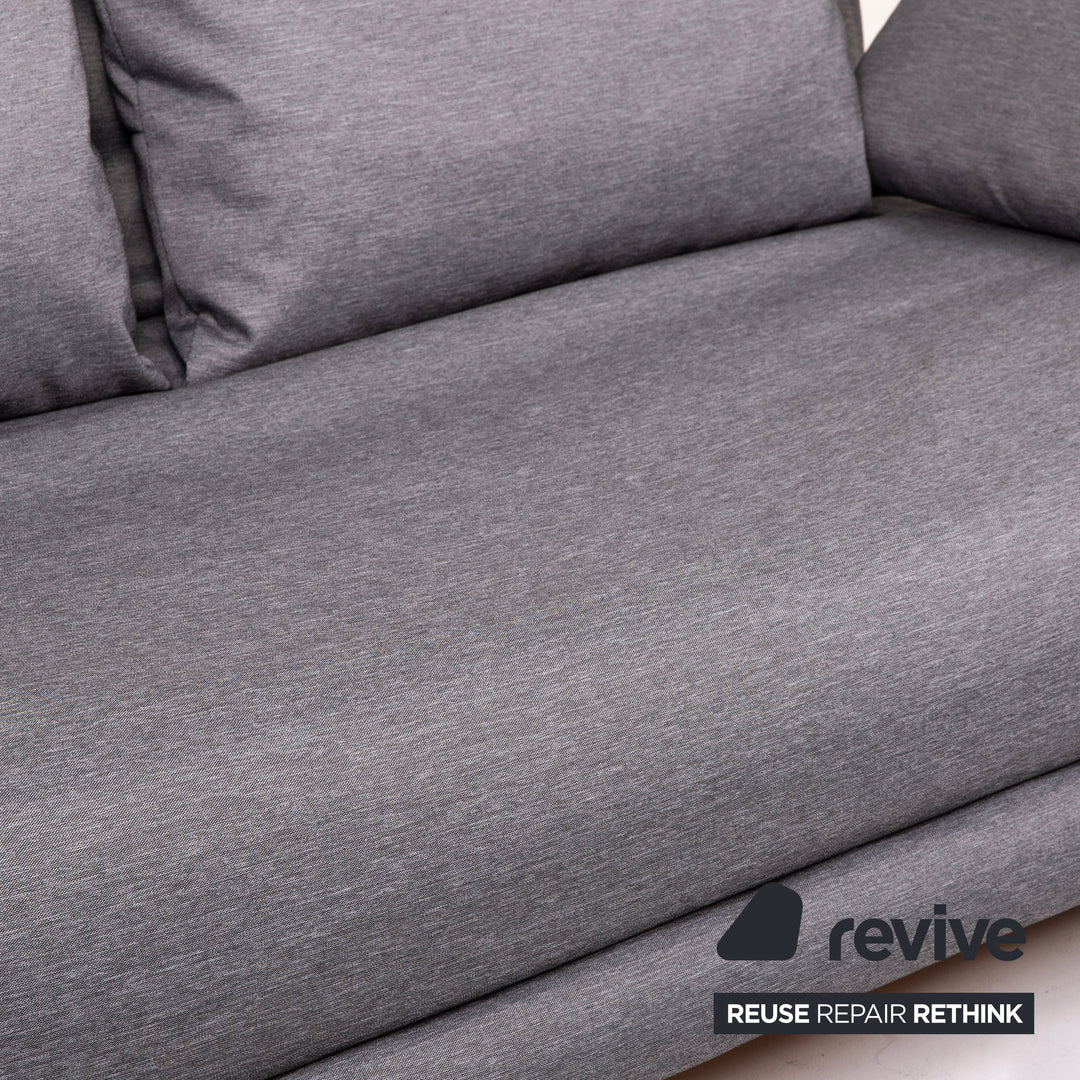 Canapé-lit en tissu Ligne Roset Multy, gris, avec fonction couchage.