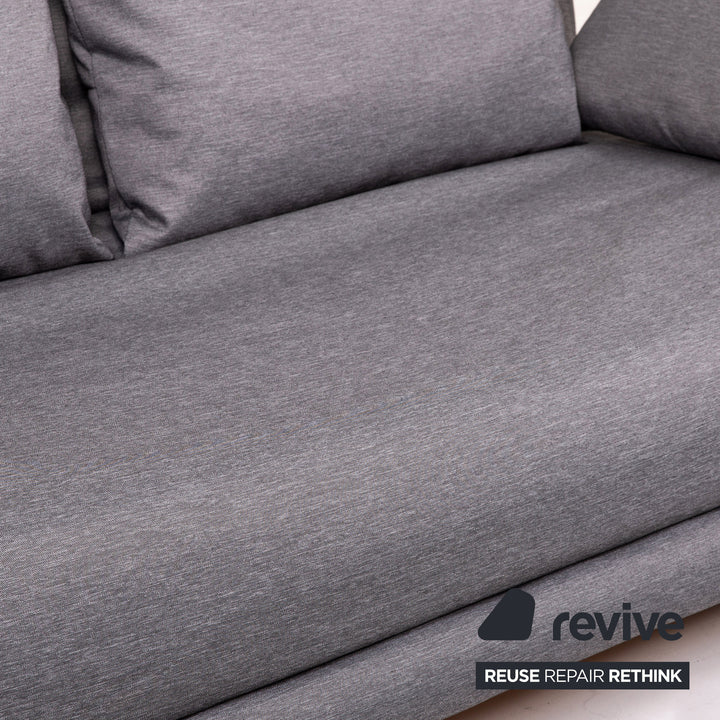 Canapé-lit en tissu Ligne Roset Multy, gris, avec fonction couchage.