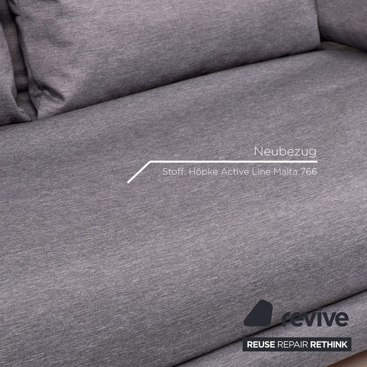 Canapé-lit en tissu Ligne Roset Multy, gris, avec fonction couchage.