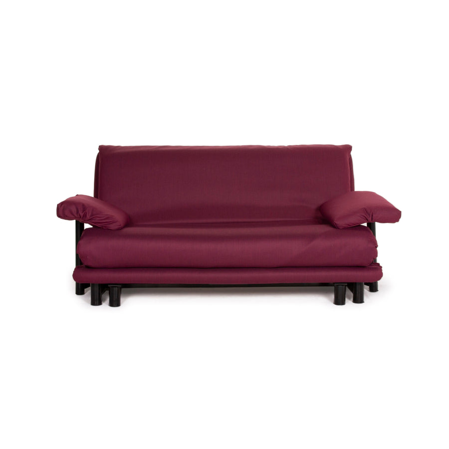 Canapé Ligne Roset Multy en tissu, violet, trois places, avec fonction convertible et accoudoirs inclus.
