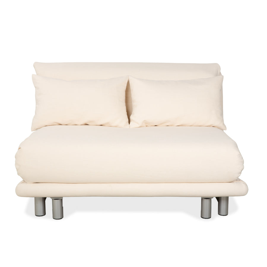 Canapé convertible deux places Ligne Roset Multy beige crème avec fonction convertible manuelle - Réfection de la tapisserie