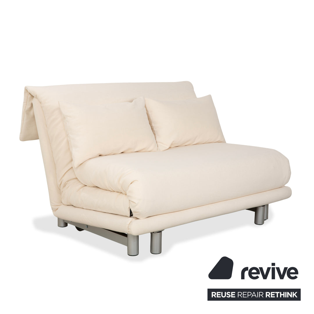 Canapé convertible deux places Ligne Roset Multy beige crème avec fonction convertible manuelle - Réfection de la tapisserie