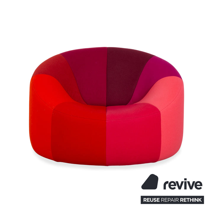 Ligne Roset Pumpkin fabric armchair in red, magenta, and pink