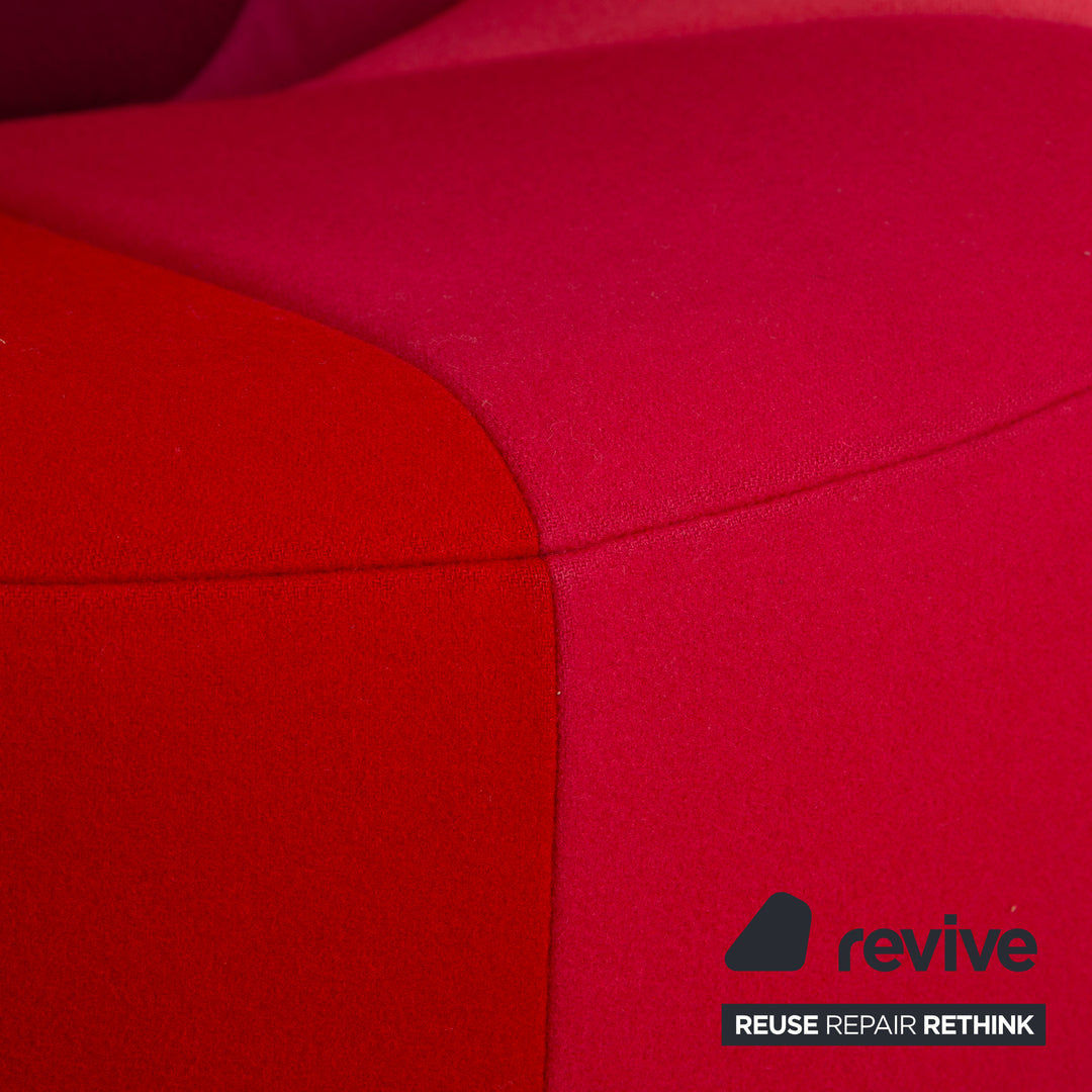 Ligne Roset Pumpkin fabric armchair in red, magenta, and pink