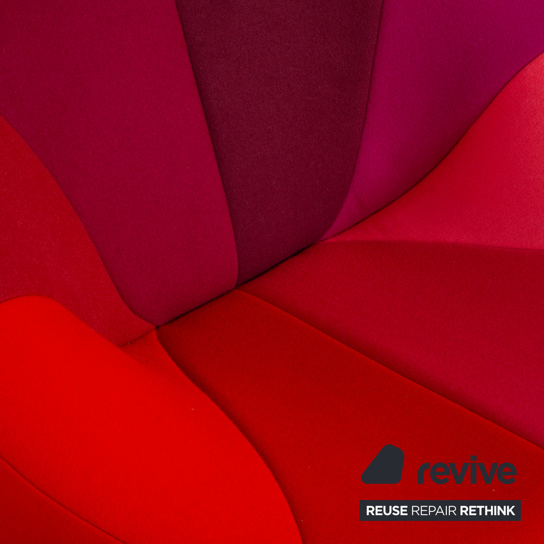 Ligne Roset Pumpkin fabric armchair in red, magenta, and pink