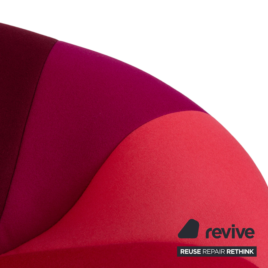 Ligne Roset Pumpkin fabric armchair in red, magenta, and pink