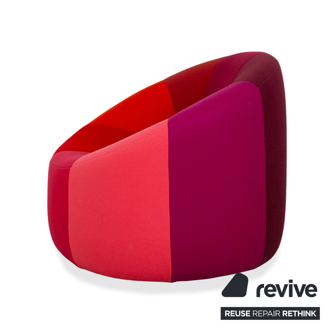 Ligne Roset Pumpkin fabric armchair in red, magenta, and pink
