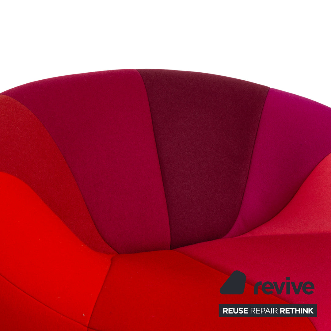 Ligne Roset Pumpkin fabric armchair in red, magenta, and pink