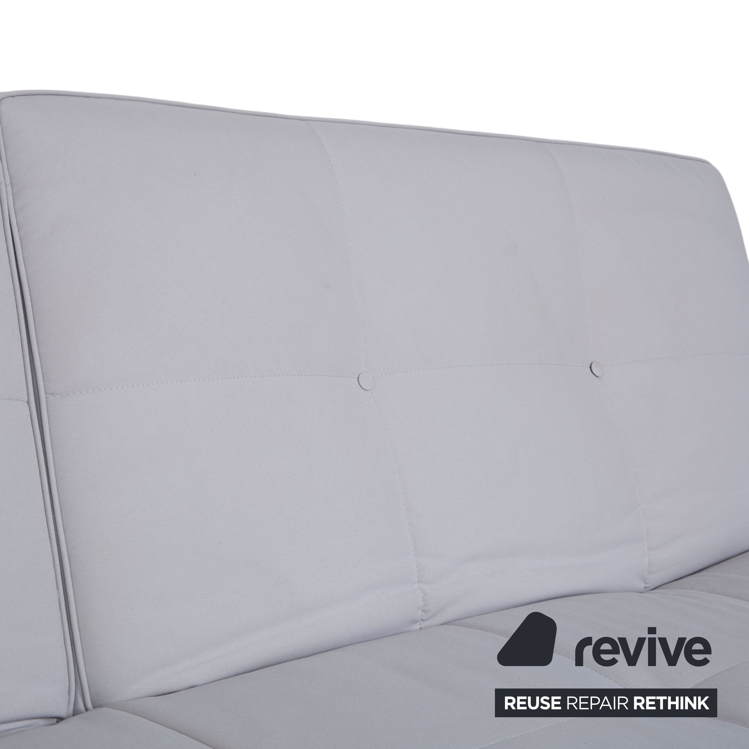 Canapé lit Ligne Roset Smala trois places en tissu gris clair avec fonction lit manuelle
