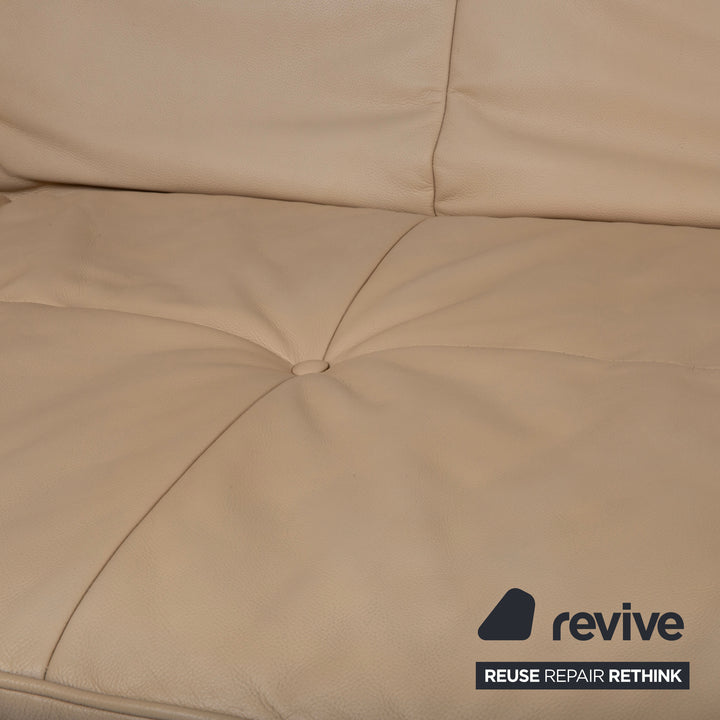 Canapé Ligne Roset Smala cuir trois places crème beige sable fonction manuelle