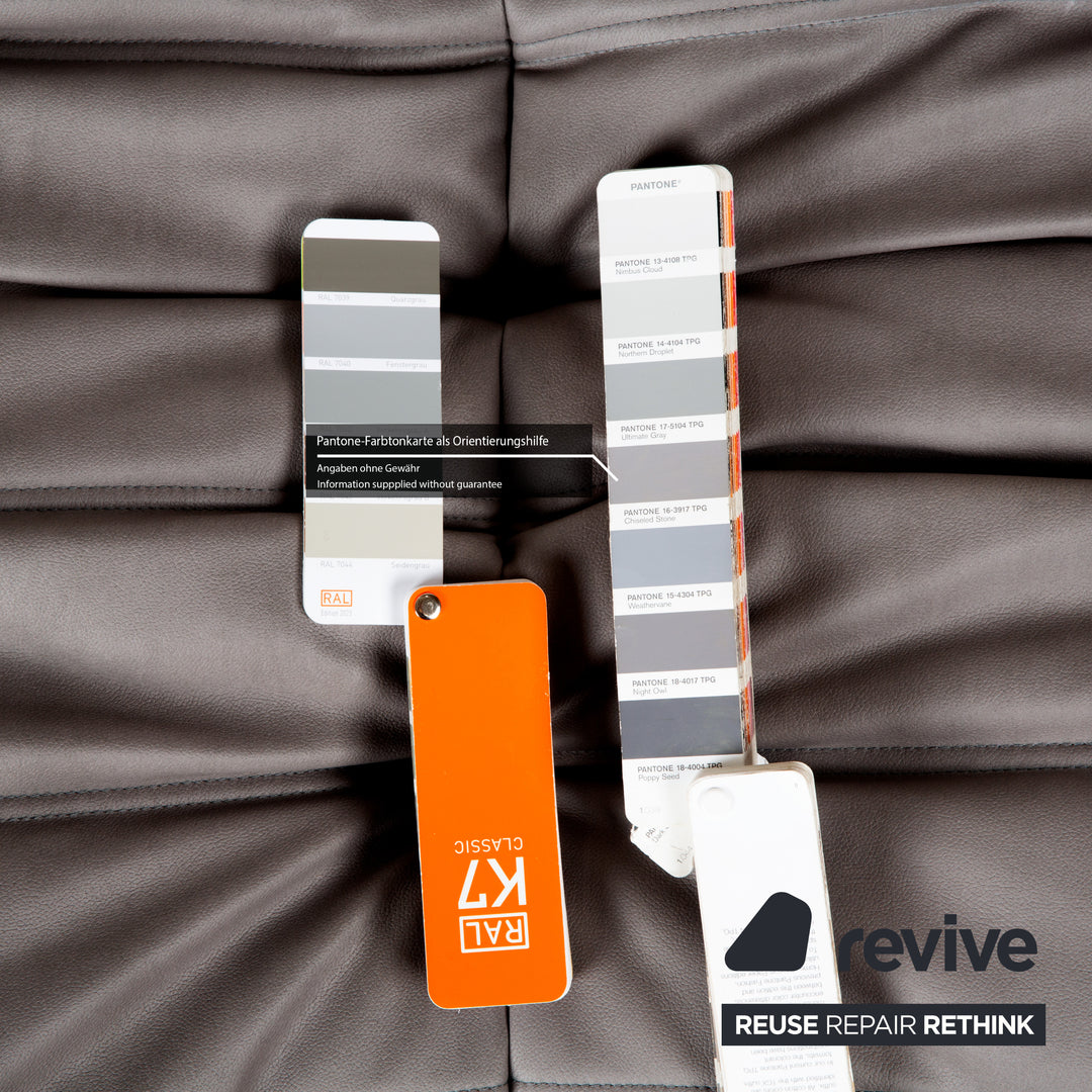 ligne roset Togo Hocker Grau veganes Leder Neubezug