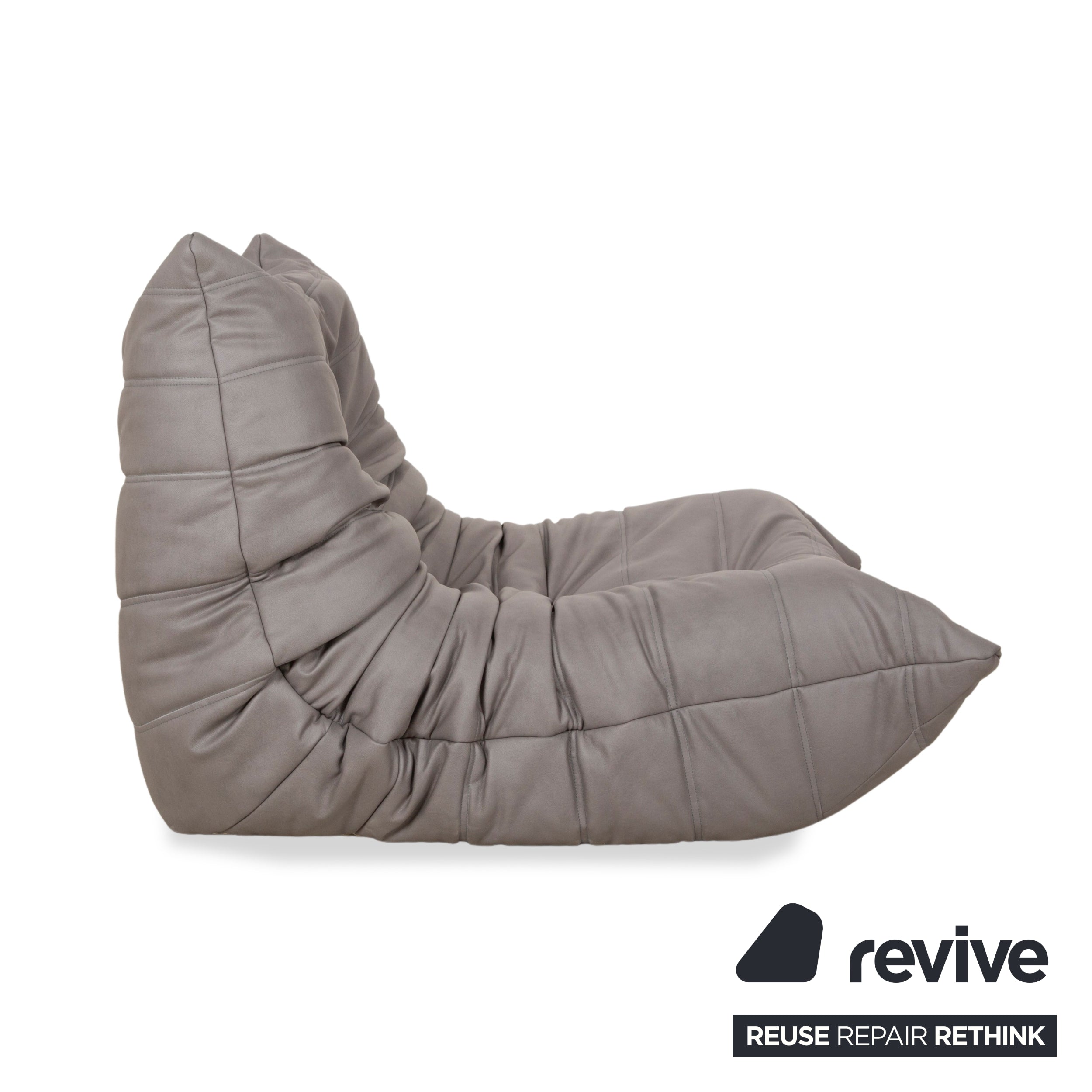 Ensemble fauteuil et tabouret Togo ligne roset en cuir vegan gris neuf