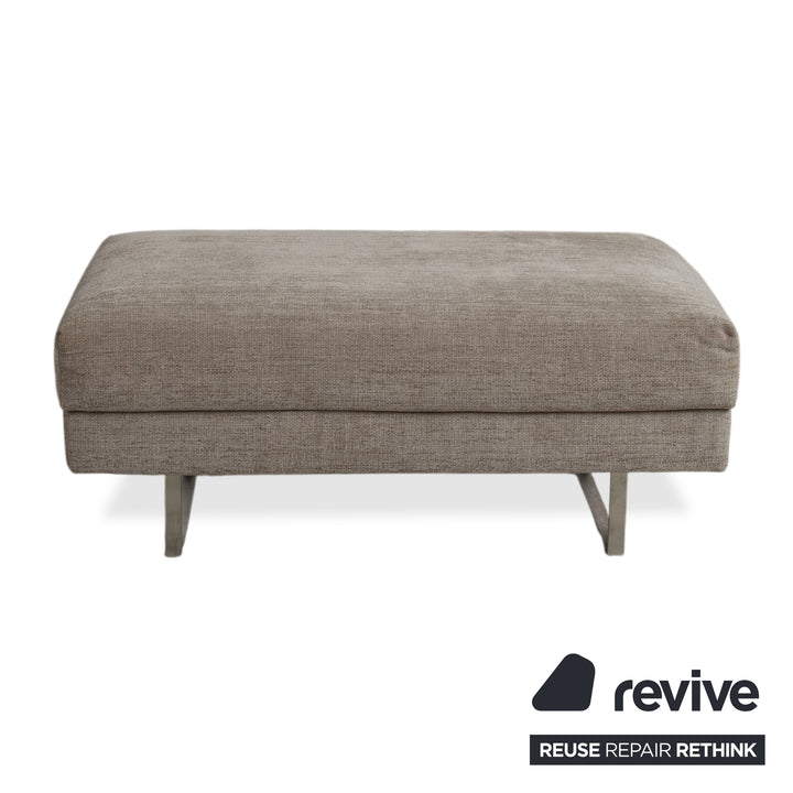 Montis Axel Stoff Hocker Grau